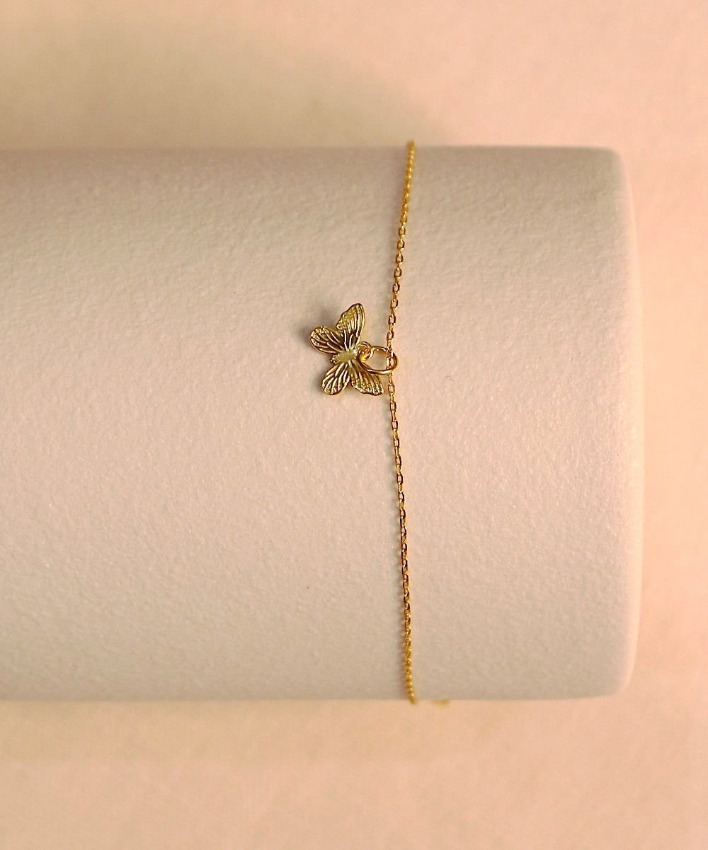 Whispers of Change – Butterfly Charm Bracelet