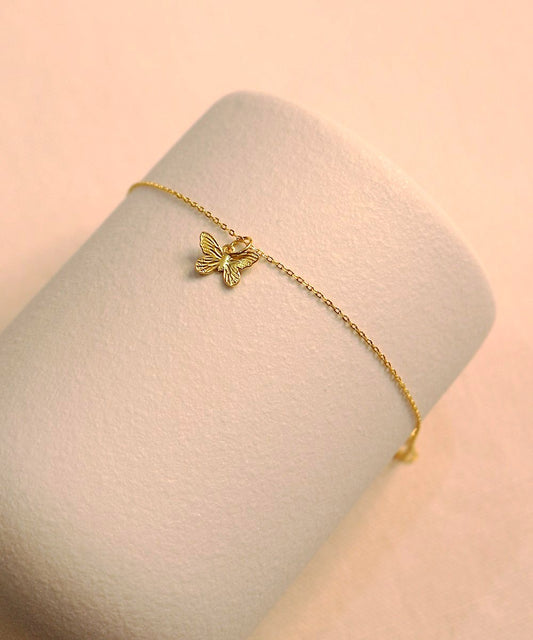 Whispers of Change – Butterfly Charm Bracelet