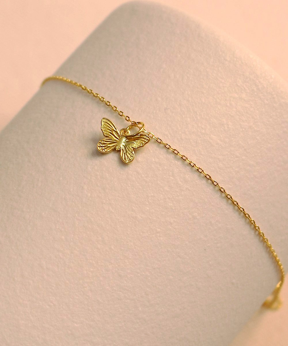 Whispers of Change – Butterfly Charm Bracelet