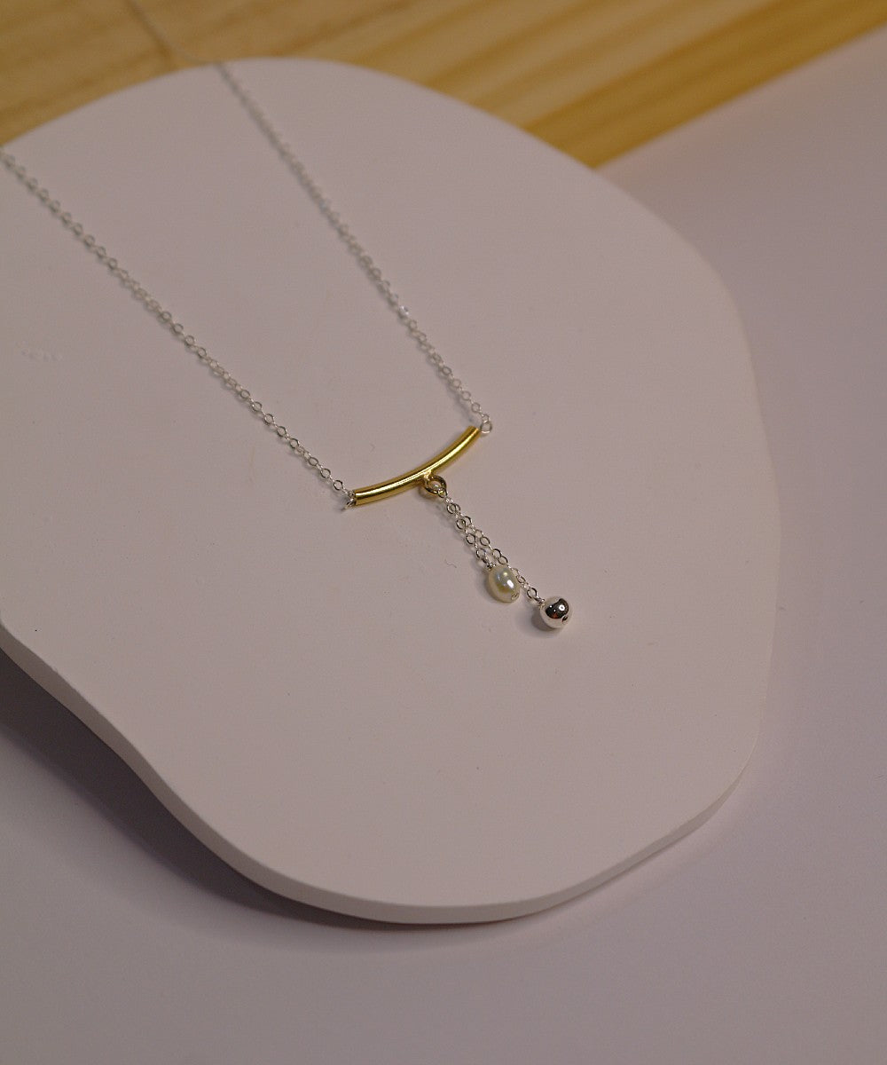 Golden Pearl Charm Necklace